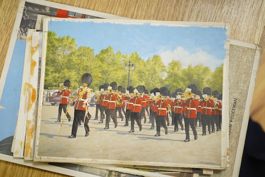 A set of thirteen original hand coloured photographs for postcards, London Pageantry scenes to include Changing the guard at Buckingham Palace, Lifeguards in the mall, London policeman and Yeoman warders at St James Pala